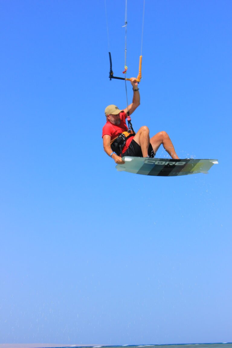 Kitesurfing in Hurghada Red Sea Egypt – kitesurfer jumping high over the water