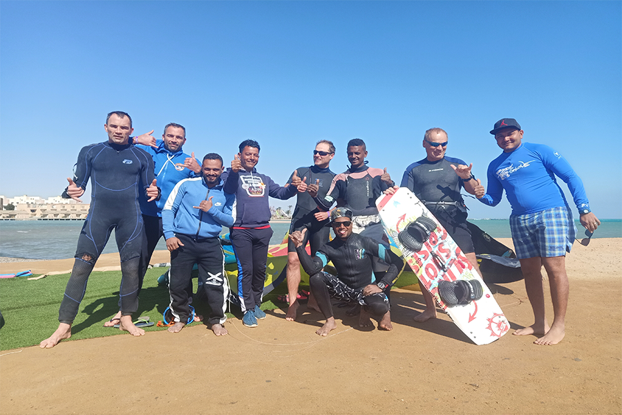Group of Kitesurfers on the Beach – Masters Surf School