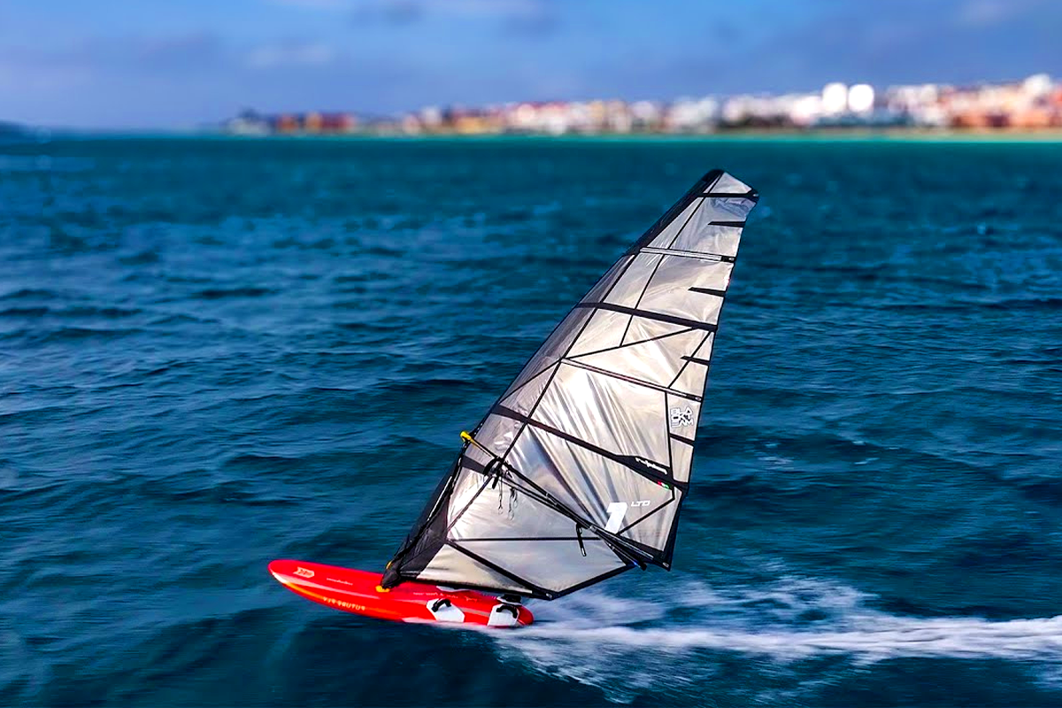 Windsurfer sailing across turquoise water at Soma Bay Hurghada Best Hurghada Windsurfing