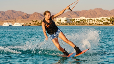 Student practicing kitesurfing in Hurghada with Masters Surf School in the shallow lagoon.