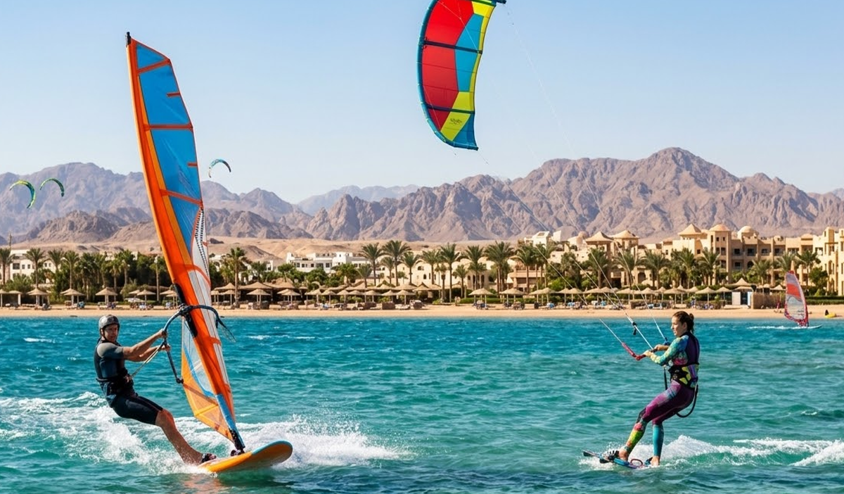 Windsurfer and kitesurfer sharing the same spot in Hurghada Egypt