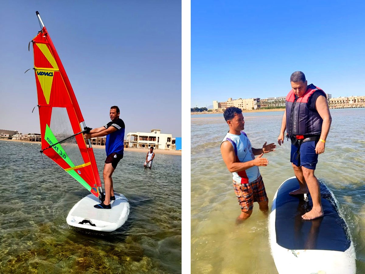 Instructor de windsurf profesional enseñando a un estudiante en el simulador de playa en Egipto.