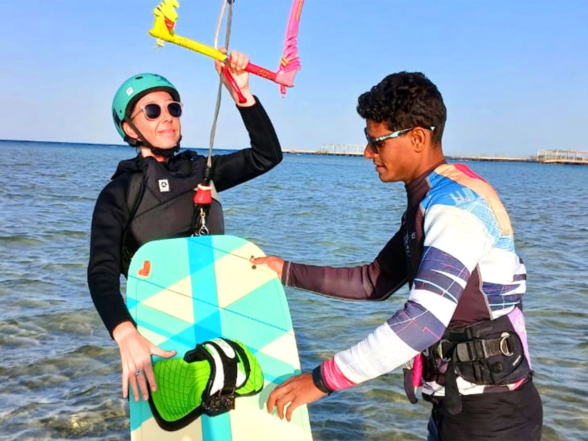 Kitesurfer riding in shallow lagoon at Masters Surf School Hurghada