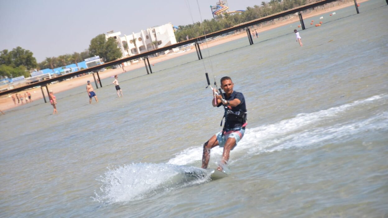 Kitesurfer riding in shallow lagoon Hurghada Red Sea
